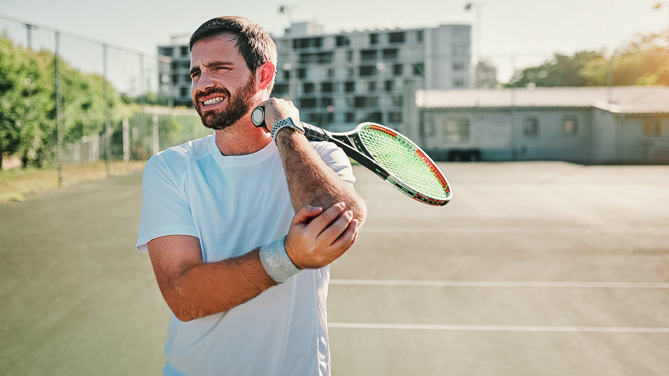 Tennis player stops playing because of pain caused by a sport injury.