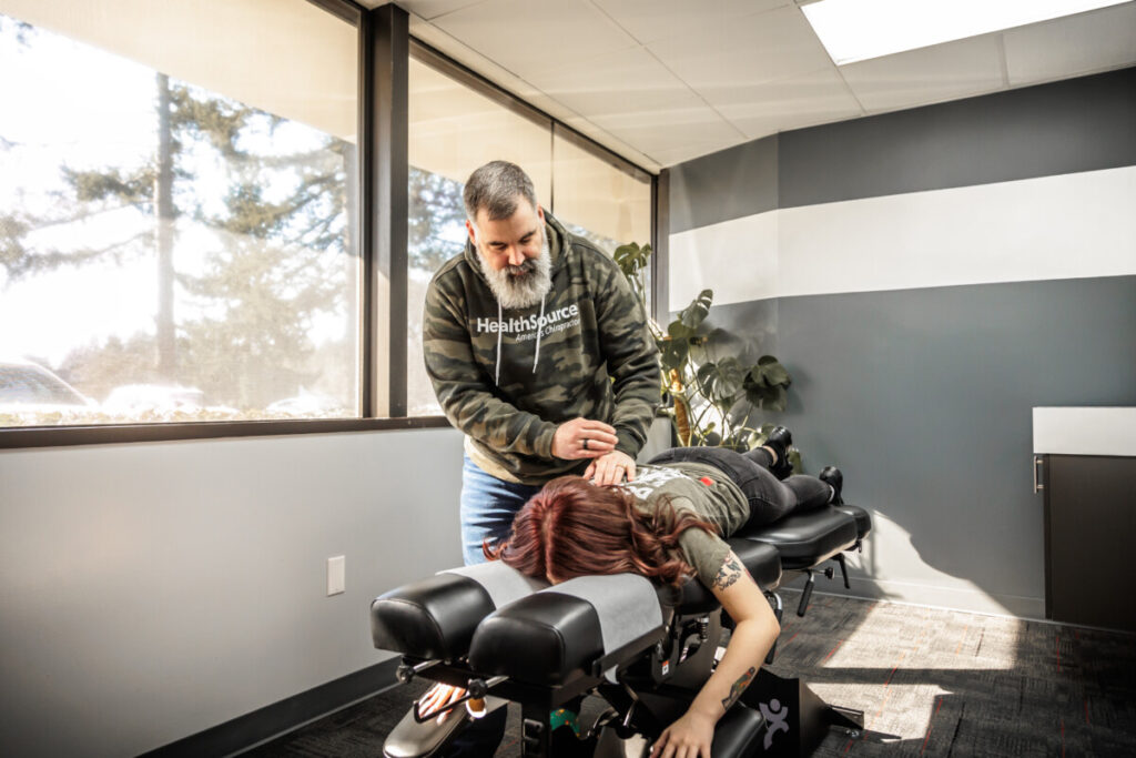 Dr. Josh Pepping adjusting a chiropractic patient at HealthSource of Federal Way.