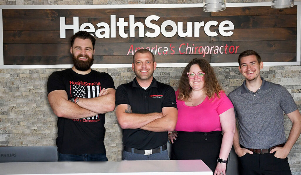 Dr. Chad Doles and team members from HealthSource of Ballwin