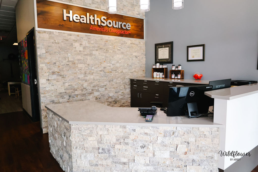 The front desk and patient check-in area at HealthSource of Rocky River.