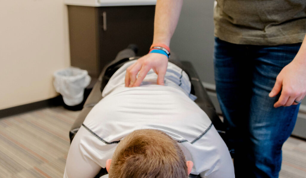 Dr. Bob Griesse adjusting a chiropractic patient at HealthSource of Fairlawn.