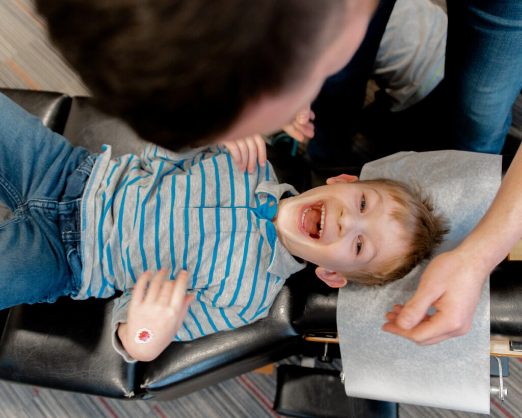 Dr. Bob Griesse adjusting a pediatric chiropractic patient at HealthSource of Fairlawn.